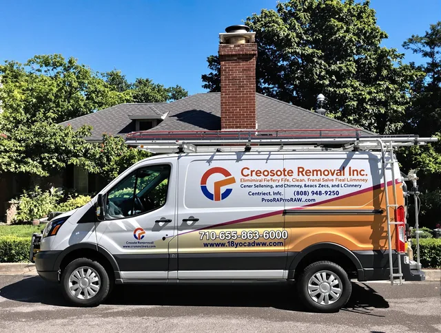 Hull Chimney Sweep technician removing creosote safely in Hull, MA